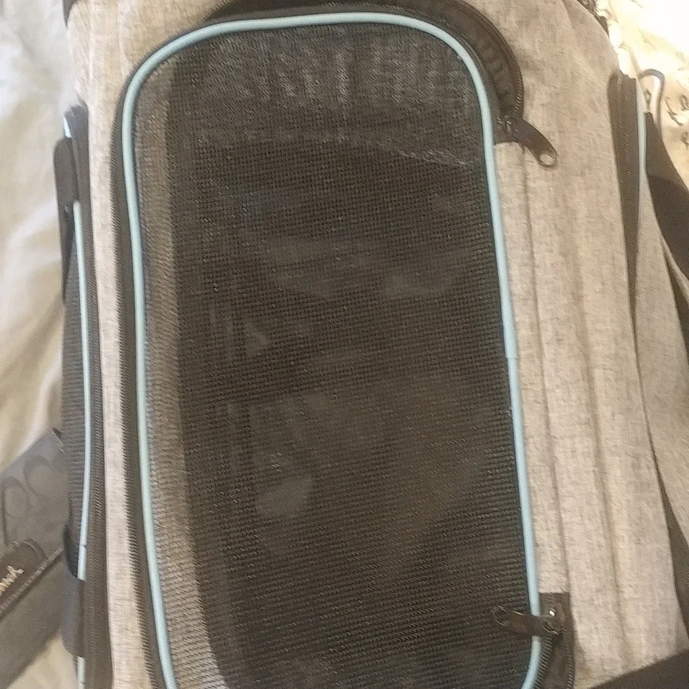 A small dog carrier excellent condition never used